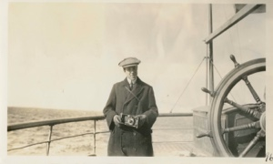 Image of Man aboard with camera